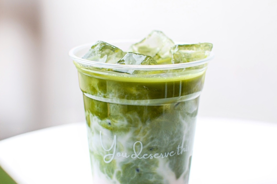 A to-go cup of silky matcha and ice.